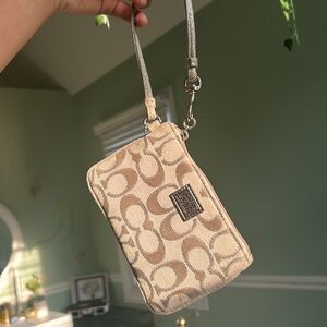 Coach tan and silver wristlet